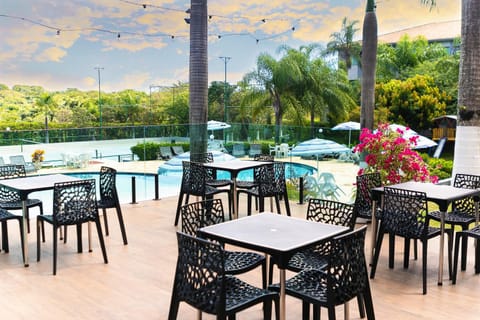 Restaurant/places to eat, Natural landscape, Garden view, Swimming pool