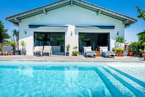 Property building, Living room, Swimming pool