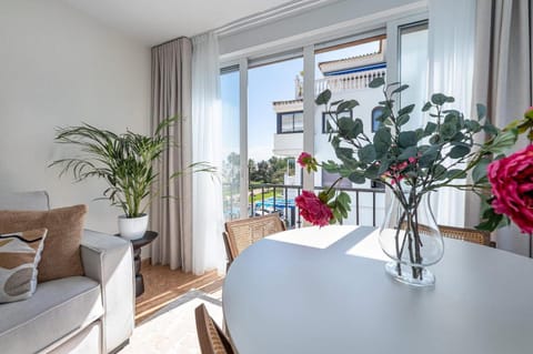 Day, View (from property/room), Living room, Seating area, Dining area, air conditioner