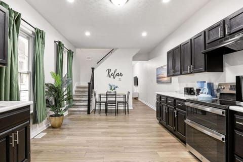 Kitchen or kitchenette, dishwasher, stove, toaster