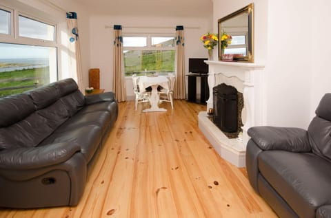 Living room, Seating area, fireplace, flat iron