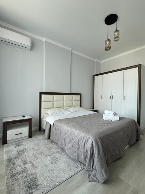Bed, Photo of the whole room, Bedroom, towels, wardrobe, air conditioner