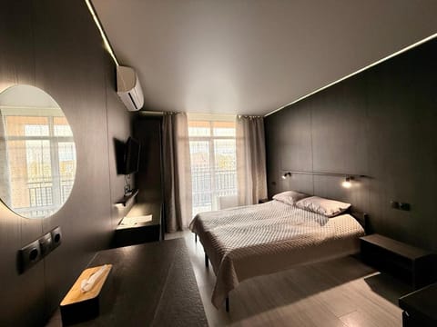 Communal lounge/ TV room, Bed, Balcony/Terrace, Kitchen or kitchenette, Dining area, flat iron, hair dryier, stove, wardrobe, washing machine, air conditioner
