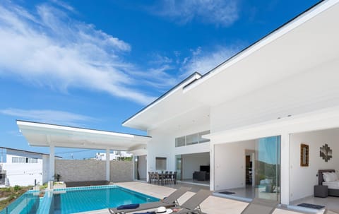 Property building, Day, Seating area, Pool view, Swimming pool, sunbed