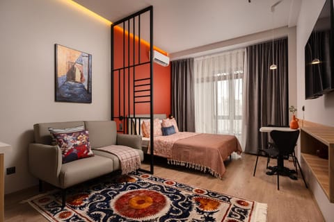 Bed, TV and multimedia, Living room, Photo of the whole room, Seating area