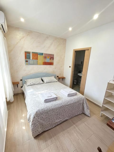 Bed, Photo of the whole room, Bedroom, towels, wardrobe, air conditioner
