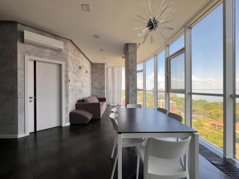 View (from property/room), Living room, Seating area, Dining area