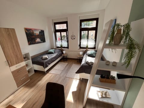Bed, TV and multimedia, Living room, Photo of the whole room, Seating area, Dining area, Bedroom