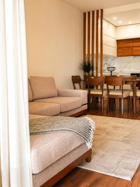 Kitchen or kitchenette, Living room, Seating area, Dining area