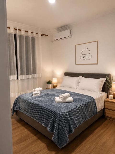 Bed, Photo of the whole room, Bedroom, towels, air conditioner