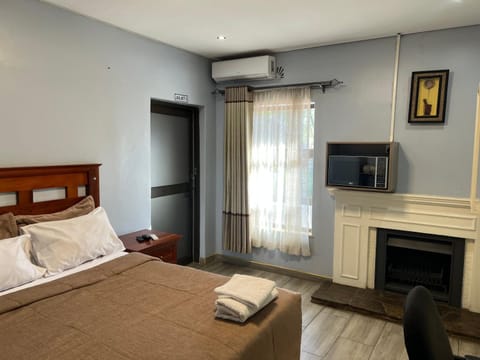 Bed, air conditioner