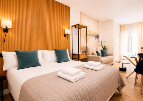 Bed, Living room, Photo of the whole room, Seating area, Bedroom, towels, wardrobe