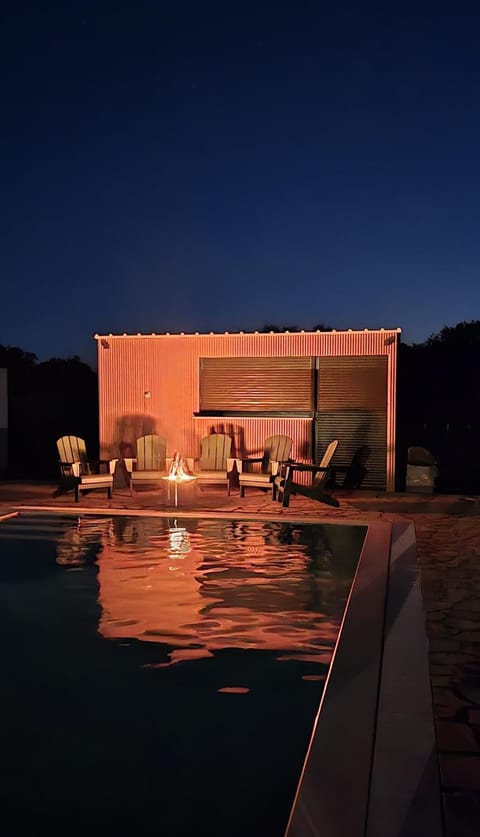 Patio, Night, Natural landscape, Pool view, Swimming pool, fireplace, sunbed