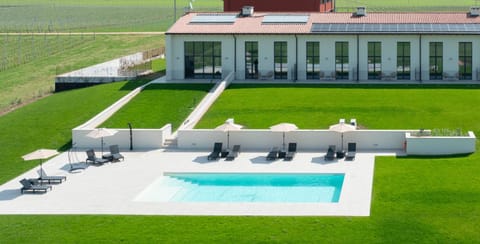 Property building, Patio, Day, Natural landscape, Garden, Garden view, Pool view, Swimming pool, sunbed