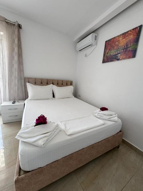 Bed, Photo of the whole room, Bedroom, towels, air conditioner