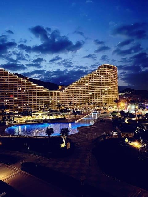 Property building, Night, City view, Pool view, Swimming pool