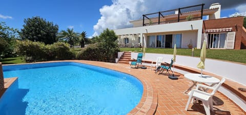 Property building, Patio, Garden, View (from property/room), Swimming pool