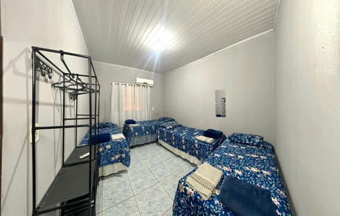 Bed, Photo of the whole room, towels, wardrobe, air conditioner
