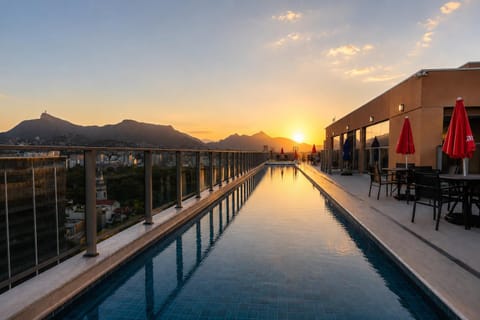 Property building, Pool view, Swimming pool, Swimming pool, Sunset