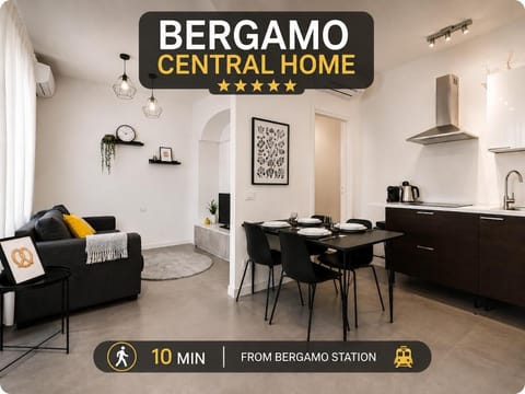 Bed, Property logo or sign, Kitchen or kitchenette, Living room, Seating area, Dining area