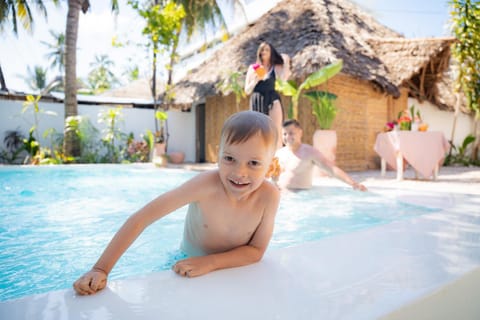 Swimming pool, children, group of guests