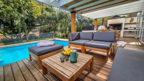Patio, BBQ facilities, View (from property/room), Seating area, Swimming pool
