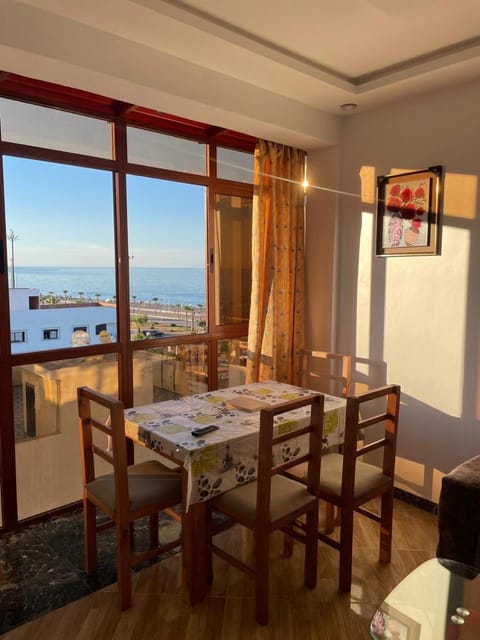 Natural landscape, View (from property/room), Living room, Seating area, Dining area, Sea view