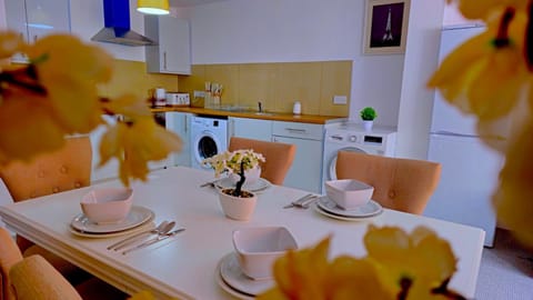 Kitchen or kitchenette, Dining area, laundry, washing machine, dryer