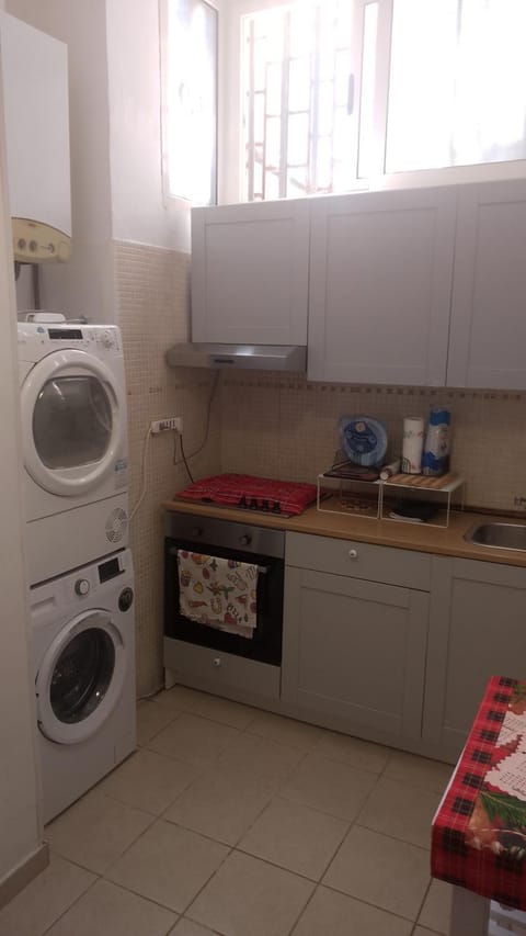 Kitchen or kitchenette, washing machine, dryer