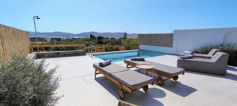 Patio, Day, Natural landscape, Pool view, Swimming pool, sunbed