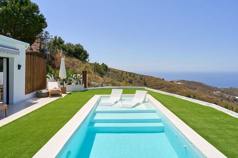 Property building, Living room, Swimming pool
