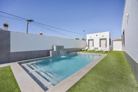 Property building, Living room, Swimming pool