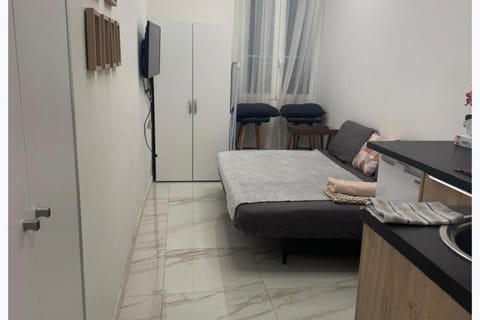 Bed, TV and multimedia, Living room, Seating area