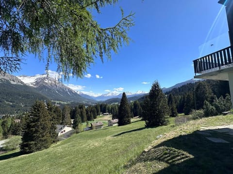 Property building, Nearby landmark, Natural landscape, Mountain view