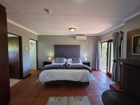 Bed, Photo of the whole room, Bedroom, towels, air conditioner