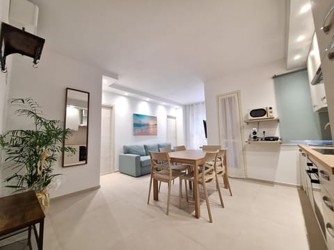 Kitchen or kitchenette, Living room, Seating area, Dining area, stove