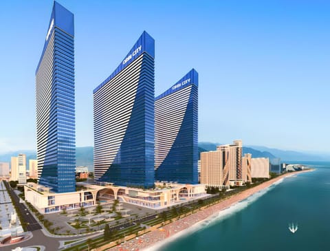 Property building, Nearby landmark, Day, Natural landscape, Beach, City view, Sea view