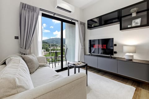 TV and multimedia, View (from property/room), Living room, Seating area, air conditioner