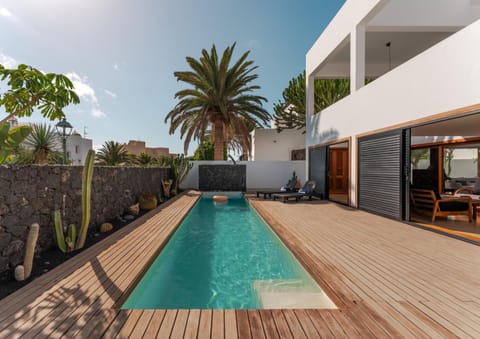 Patio, Day, Pool view, Swimming pool, sunbed