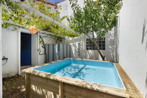 Property building, Living room, Swimming pool