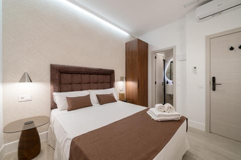 Bed, Photo of the whole room, Bedroom, towels, wardrobe, air conditioner