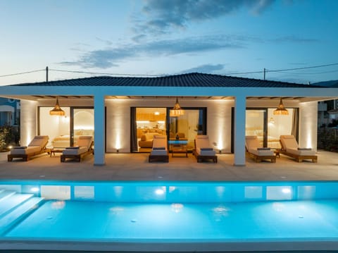 Property building, Night, Pool view, Swimming pool, sunbed
