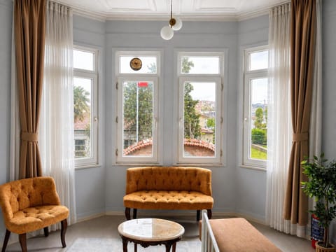 View (from property/room), Living room, Seating area, Landmark view, Sea view