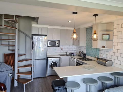 Kitchen or kitchenette, oven, stove, toaster