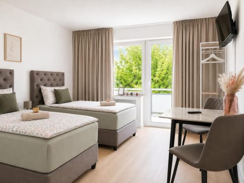 Communal lounge/ TV room, Bed, TV and multimedia, View (from property/room), View (from property/room), Balcony/Terrace, Balcony/Terrace, Photo of the whole room, Decorative detail, Decorative detail, Seating area, Dining area, Bedroom, Garden view, Garden view, cot, towels, towels, wardrobe
