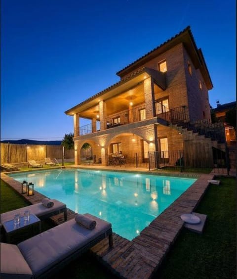 Property building, Night, Natural landscape, Pool view, Swimming pool, Swimming pool, sunbed