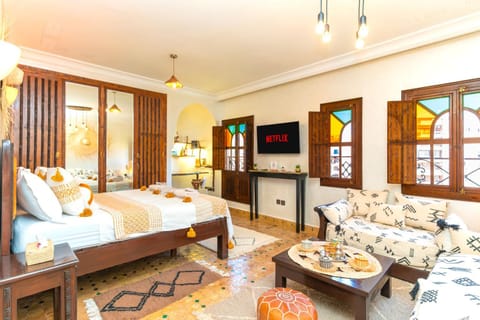 Communal lounge/ TV room, Bed, Living room, Photo of the whole room, Seating area, Bedroom