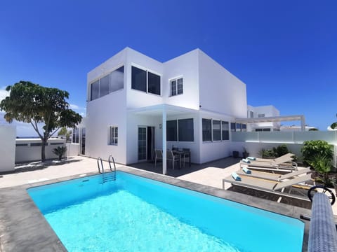 Property building, Living room, Swimming pool