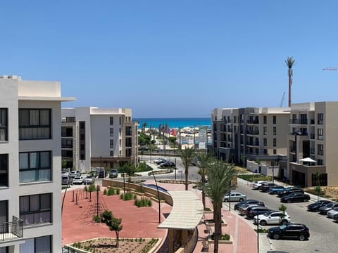 Property building, Day, Neighbourhood, Natural landscape, Beach, Sea view, Street view, Location, Parking