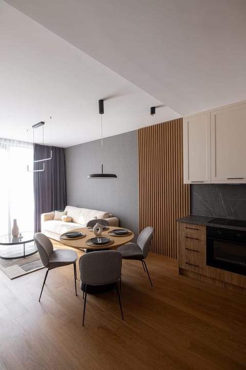 Kitchen or kitchenette, Living room, Seating area, Dining area